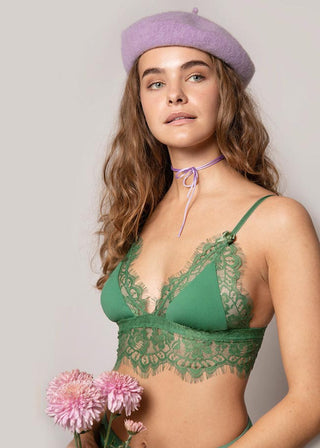 elegant woman in green bralette with lace from lioa lingerie