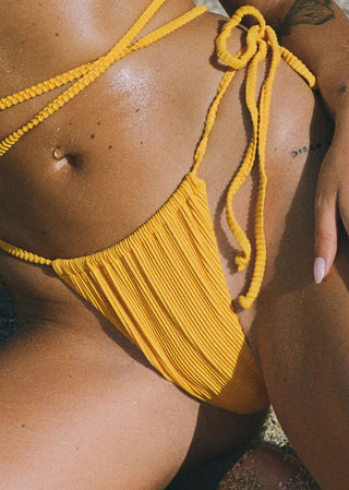 detail of orange bikini with ribbed texture from lioa lingerie.