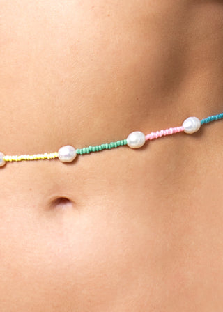 detail of bodychain with colorful beads and pearl details from lioa lingerie