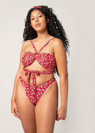 curvy woman wear red wrap bikini top with floral details