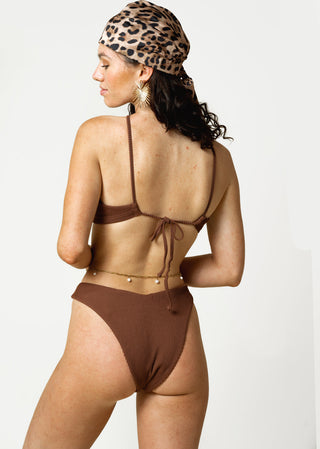 woman wears cheeky brown bikini bottom by lioa lingerie